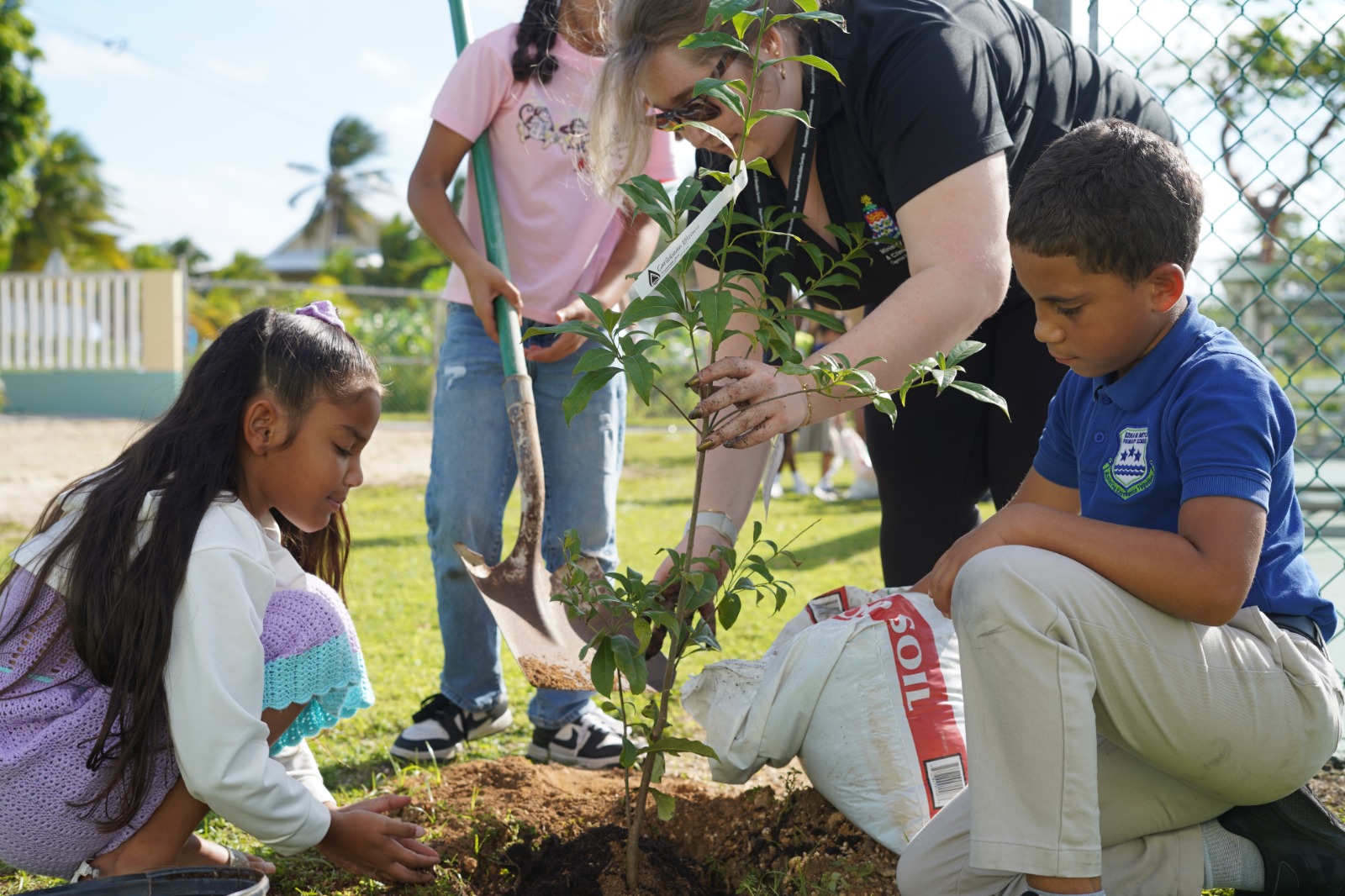 Students from Edna Moyle Primary School participate in planting as part of the National Tree Planting Programme