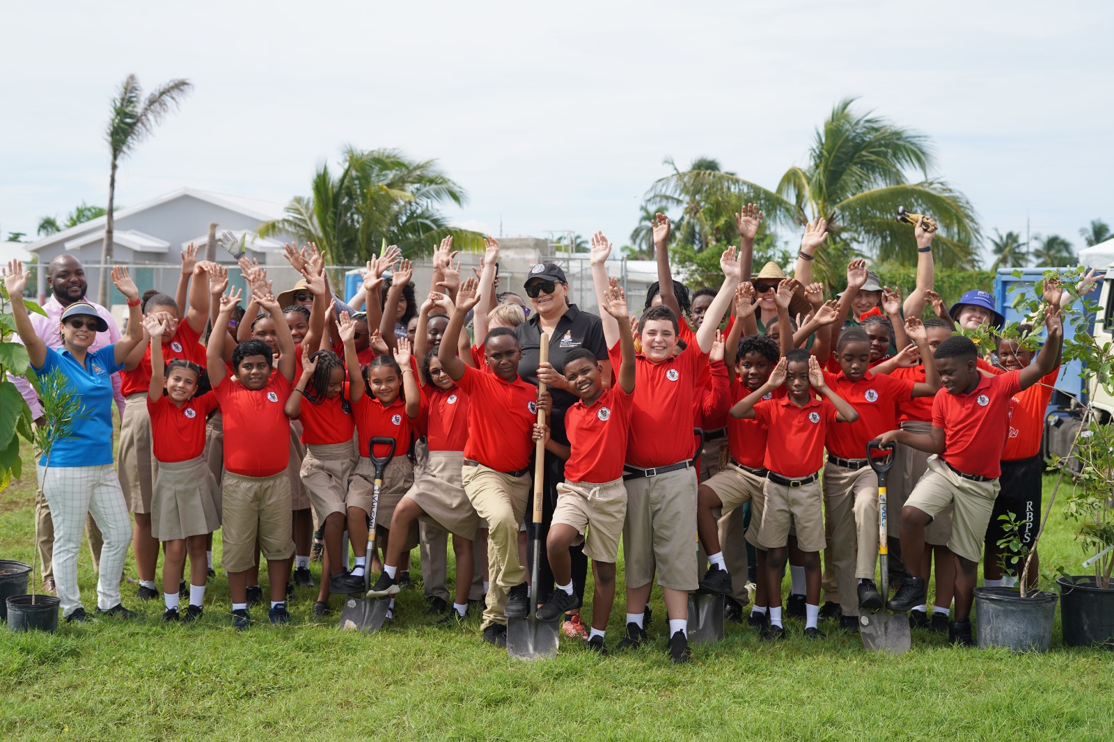 Group of students from Red Bay Primary celebrate and pose for a picture after participating in the national tree planting programme lead by the Cayman Islands Government.